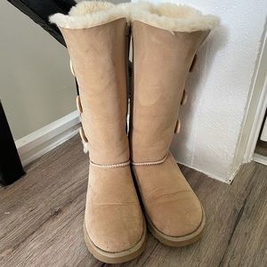 Size 7 sand colored Ugg’s with buttons